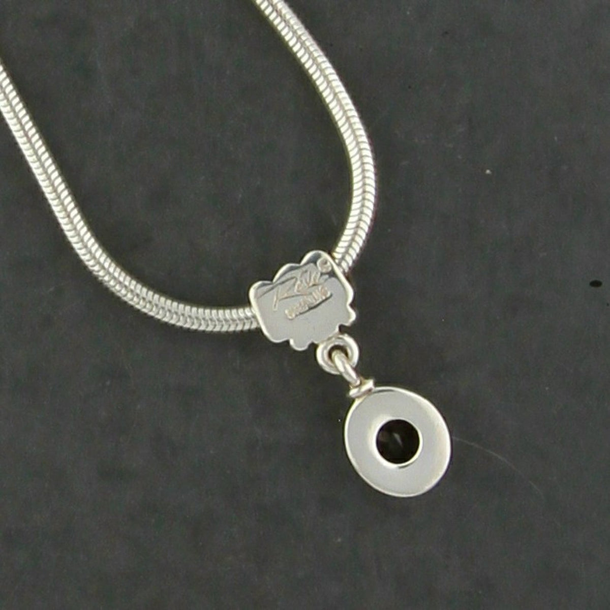 Don & Elizabeth Buck Sterling Silver Reve Oval Garnet Snake Necklace 17in