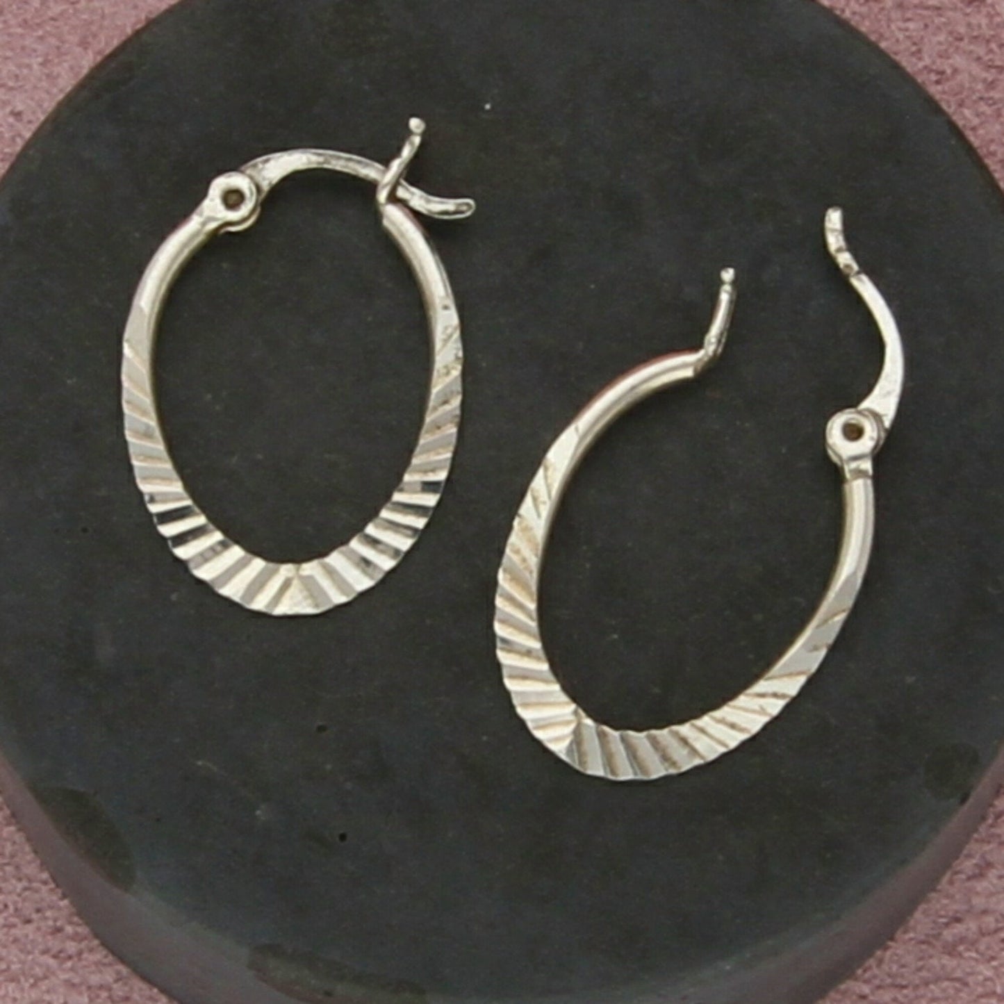sterling silver diamond-cut oval snap-post hoop earrings