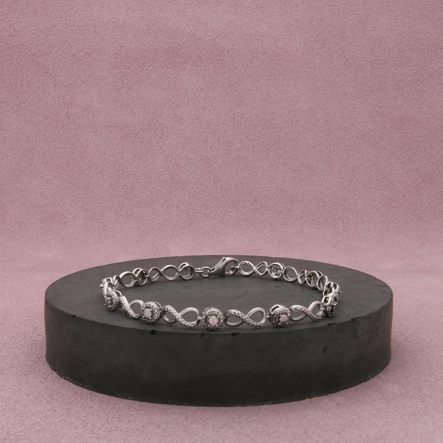 sterling silver studded infinity tennis style bracelet size 7in