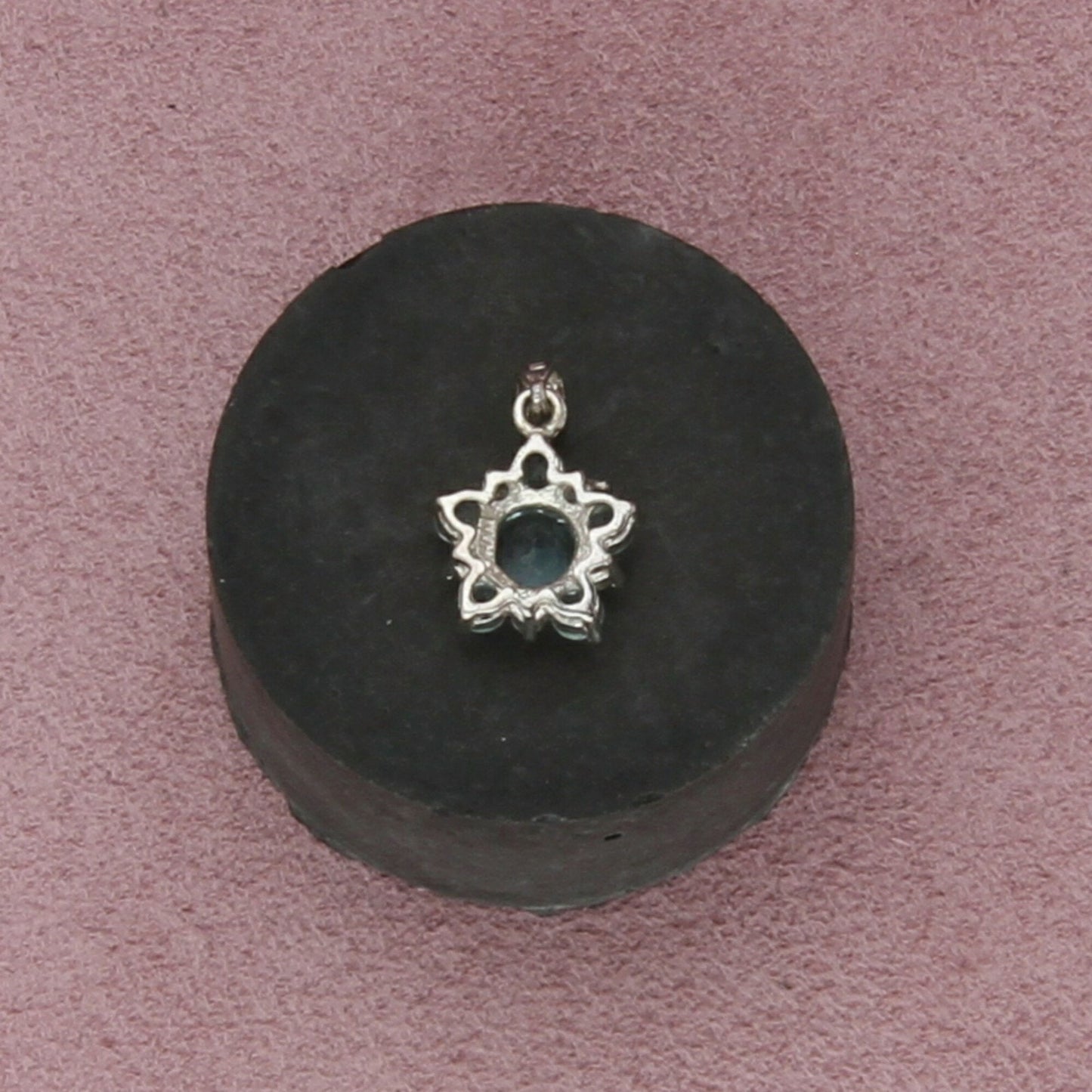 sterling silver blue topaz flower pendant