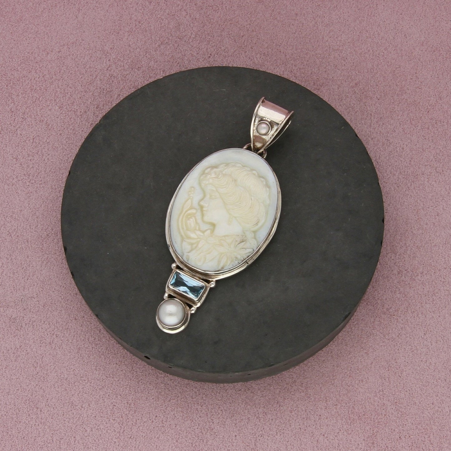 sterling silver topaz & carved mother of pearl silhouette pendant