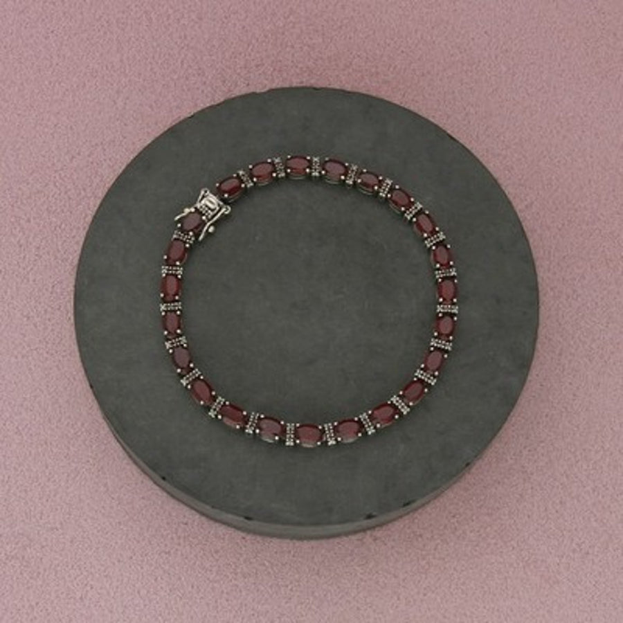 Sterling Silver Prong-Set Faceted Oval Red Garnet Tennis Bracelet Size 7.25in