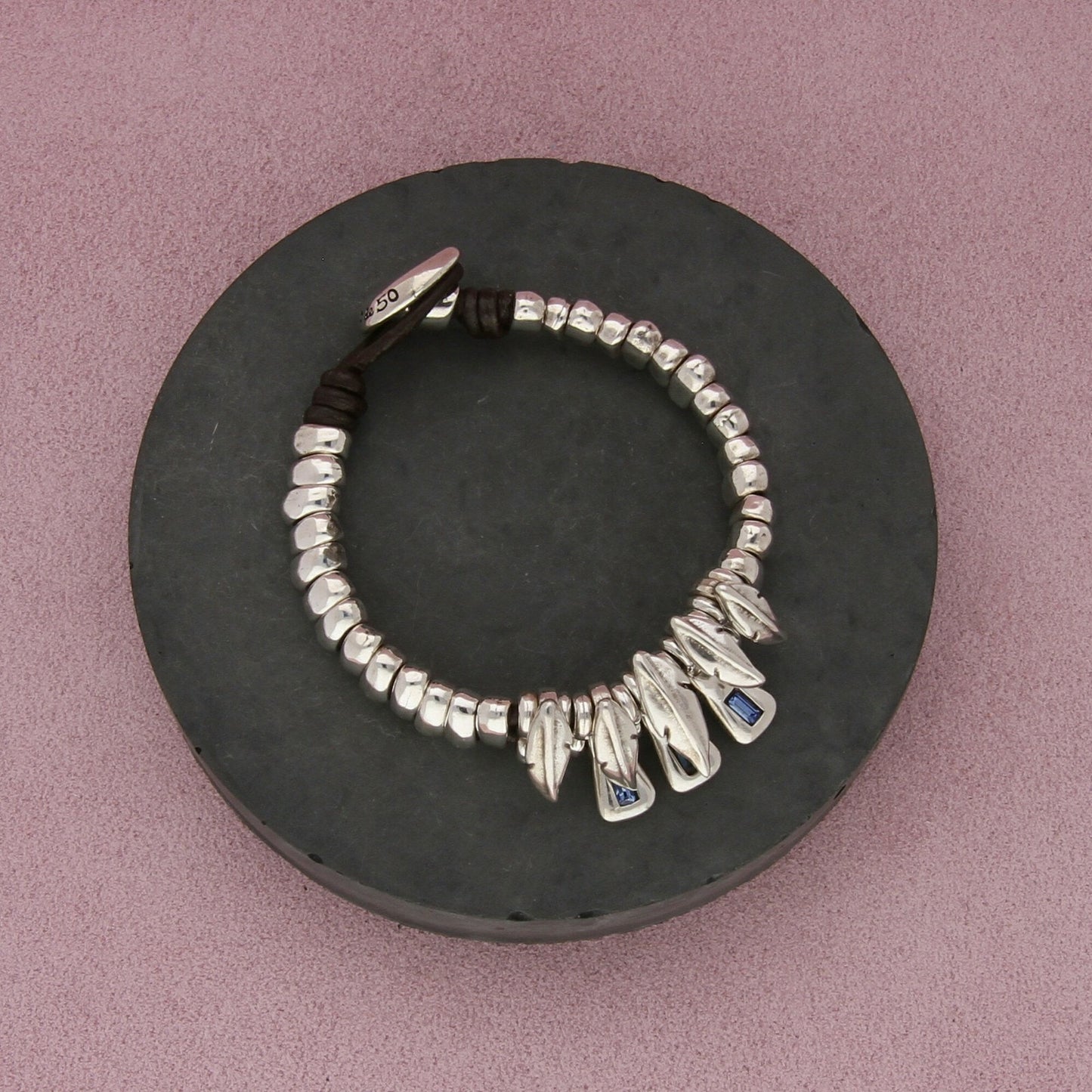 uno de 50 silver plated blue crystal feathers leather bracelet size 7in