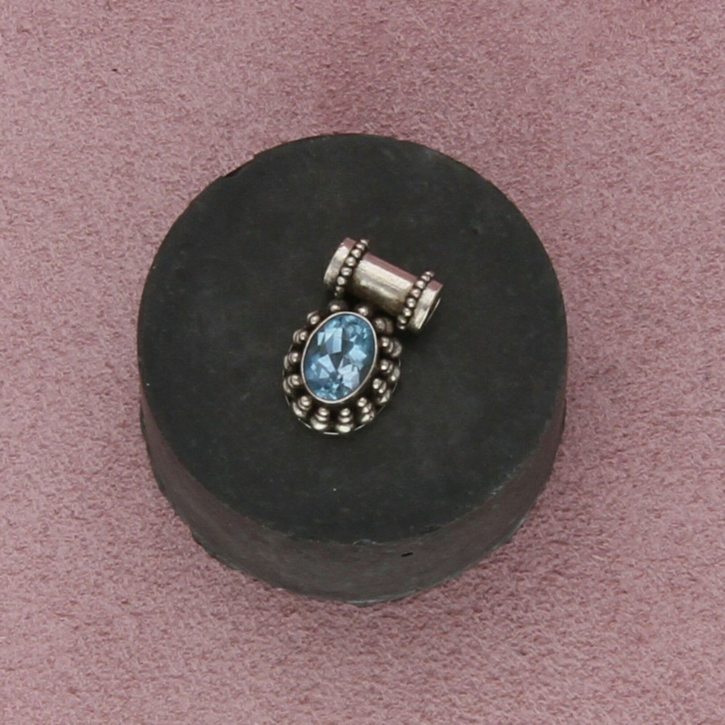 sterling silver beaded oval-cut blue topaz pendant