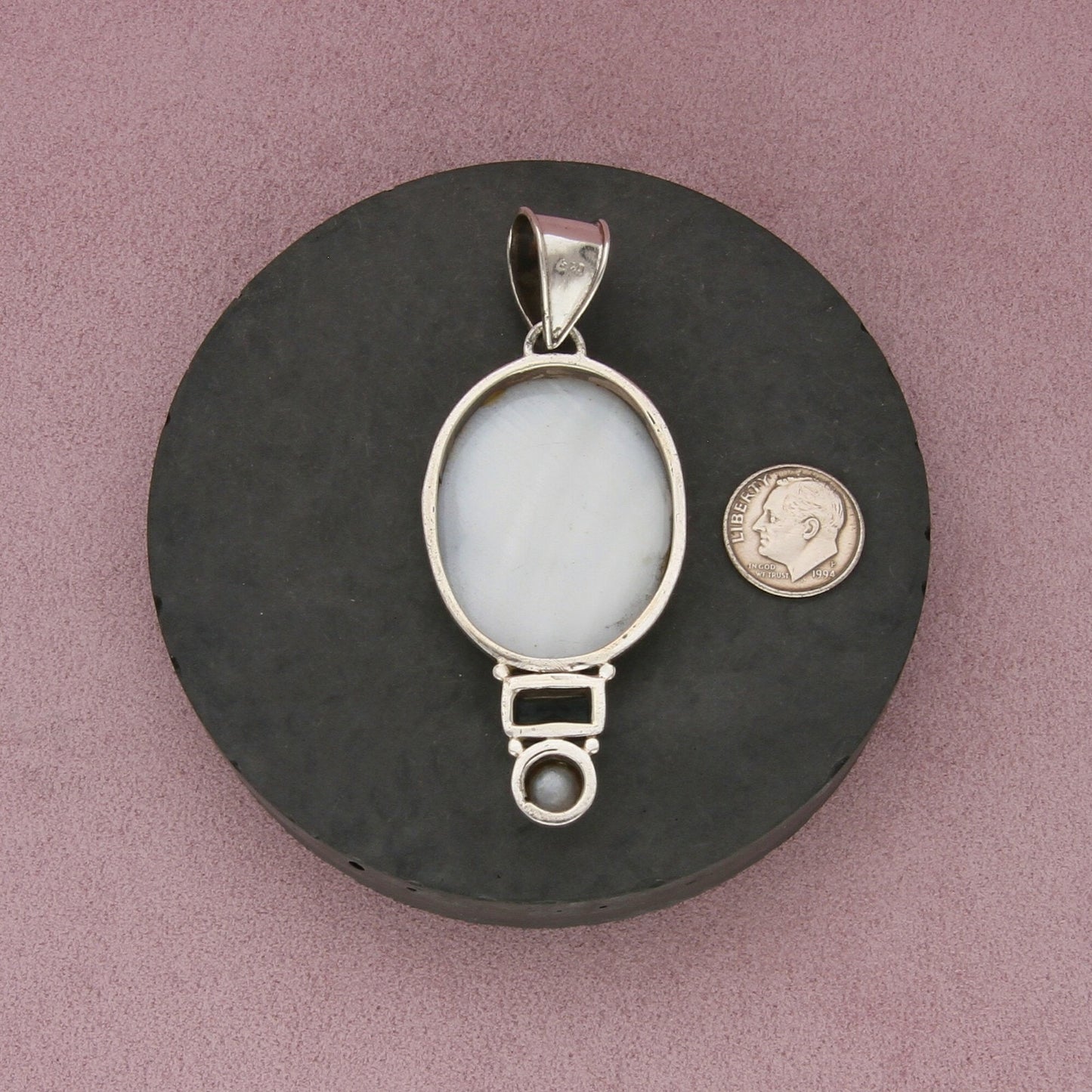 sterling silver topaz & carved mother of pearl silhouette pendant