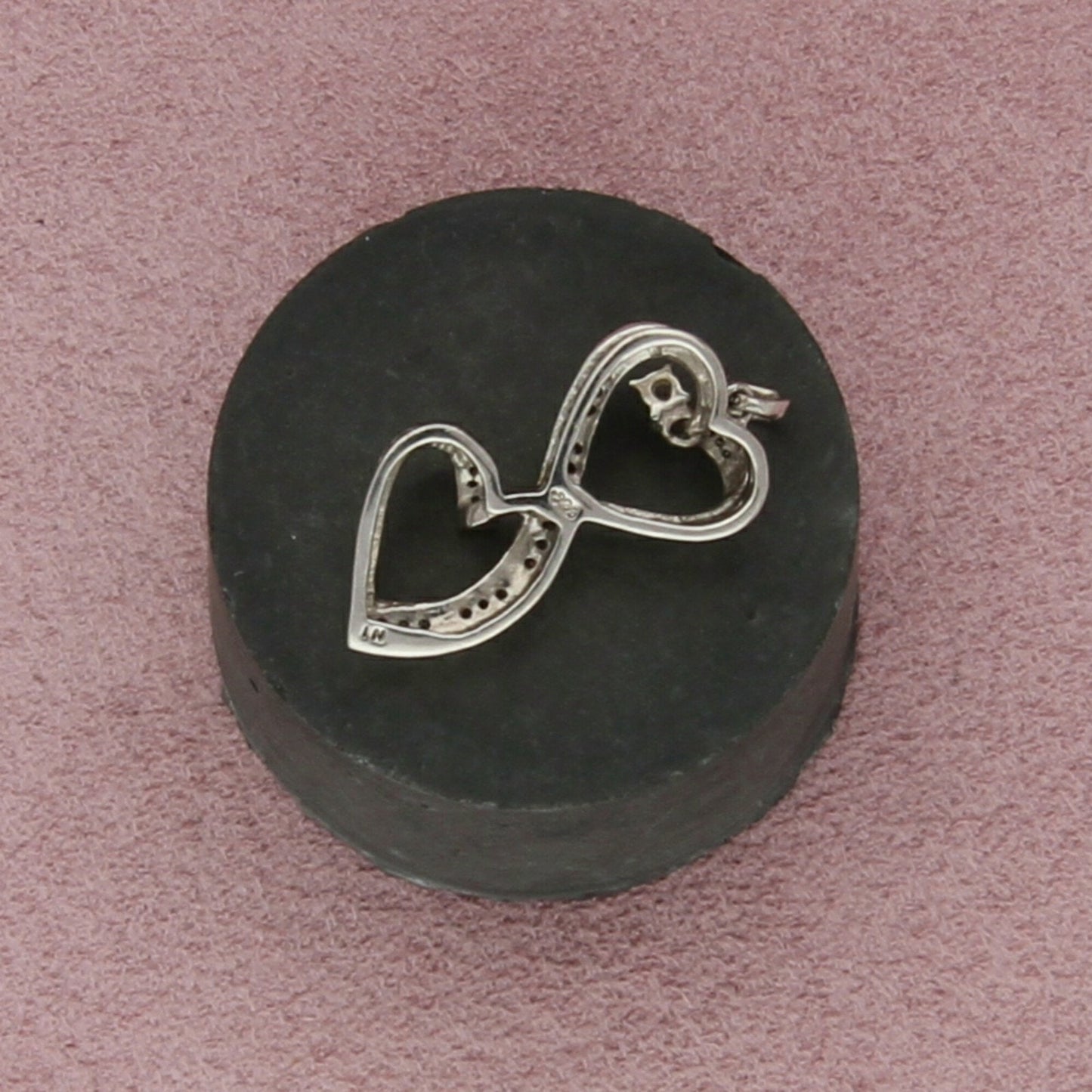 sterling silver diamond accent hearts pendant