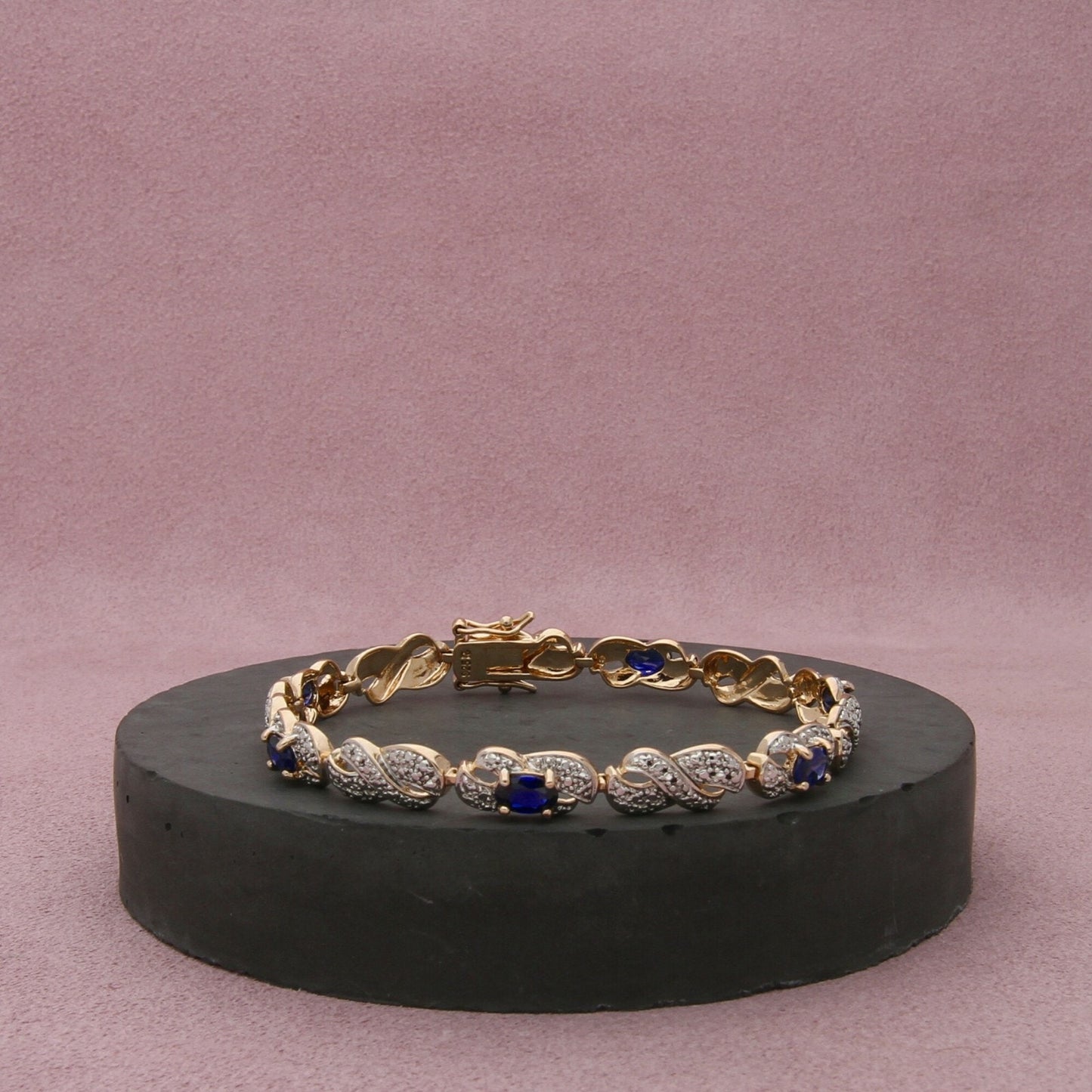 sterling silver gold plate sapphire x tennis bracelet size 7.5in