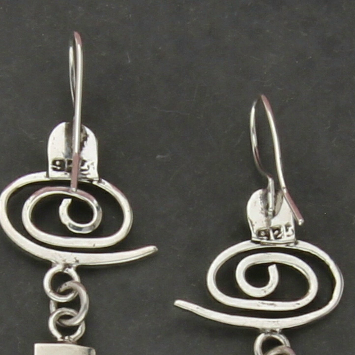 sterling silver swirl dangle earrings