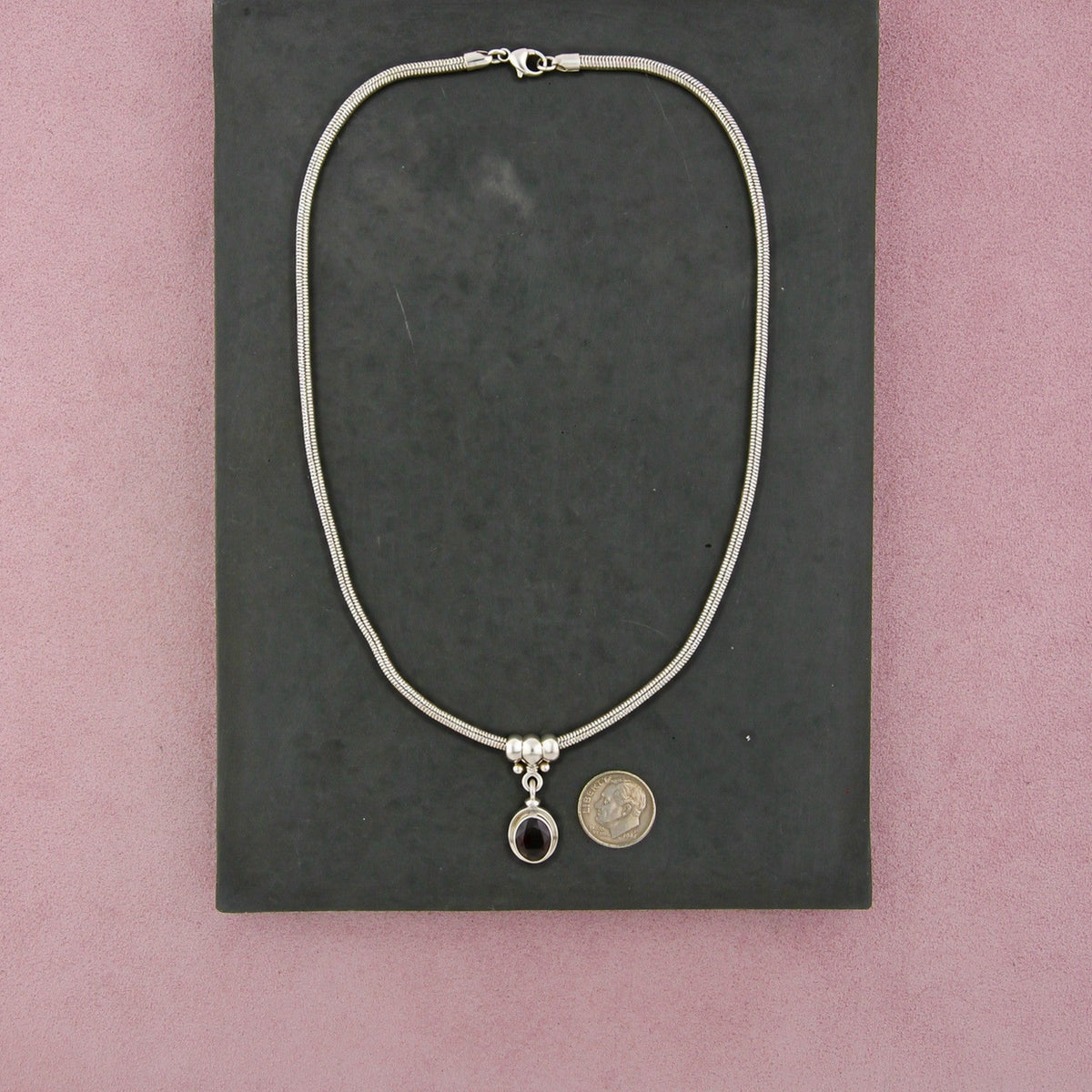 Don & Elizabeth Buck Sterling Silver Reve Oval Garnet Snake Necklace 17in