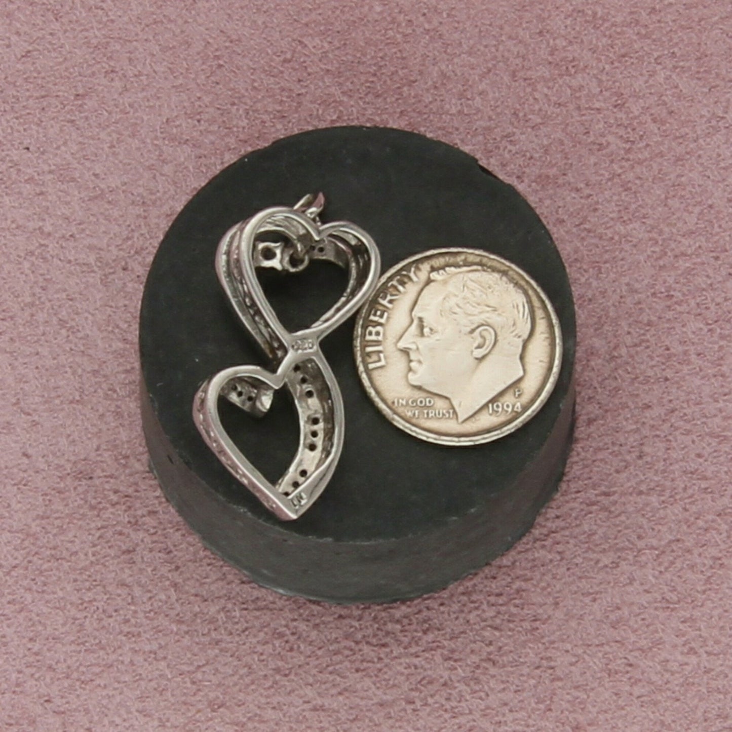 sterling silver diamond accent hearts pendant