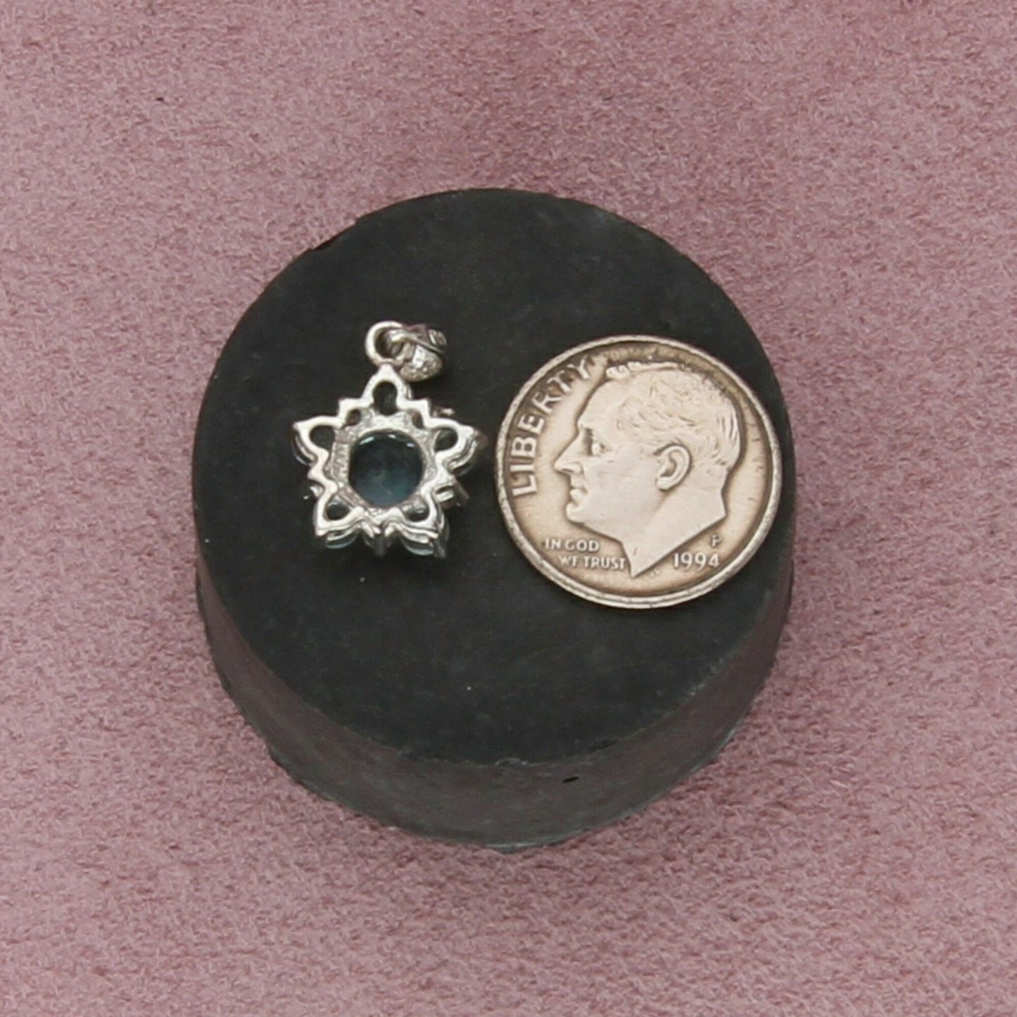 sterling silver blue topaz flower pendant