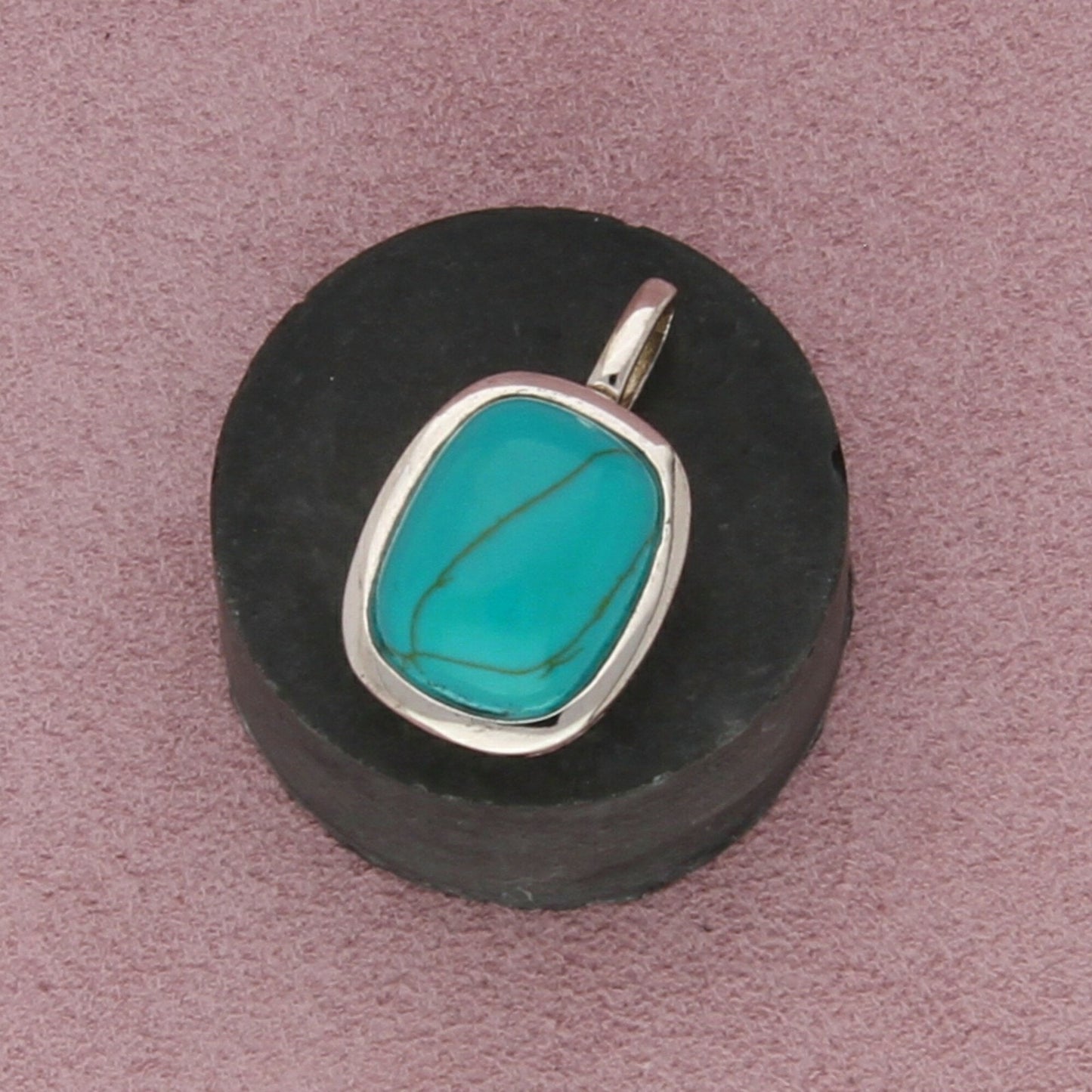 sterling silver bezel-set turquoise pendant