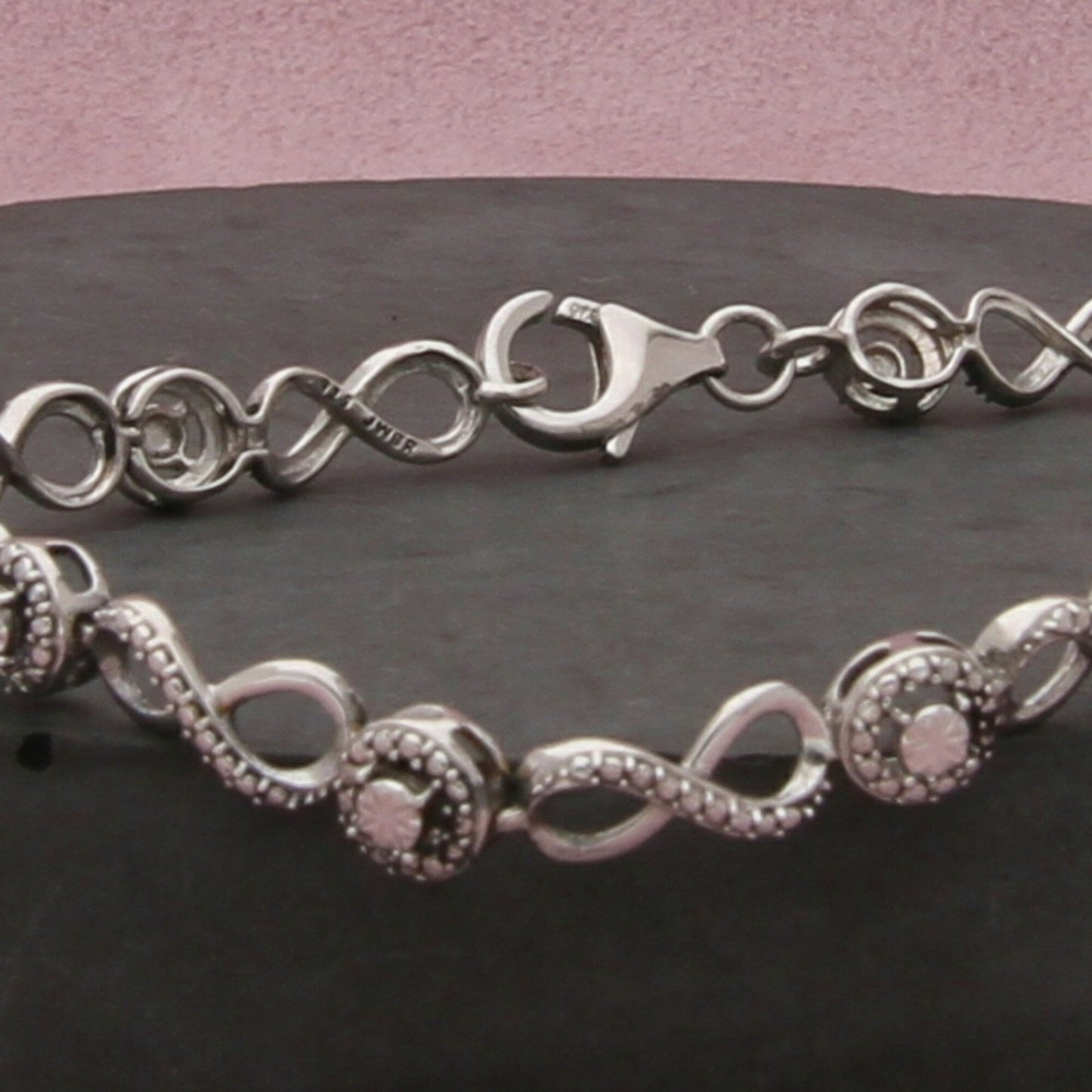 sterling silver studded infinity tennis style bracelet size 7in