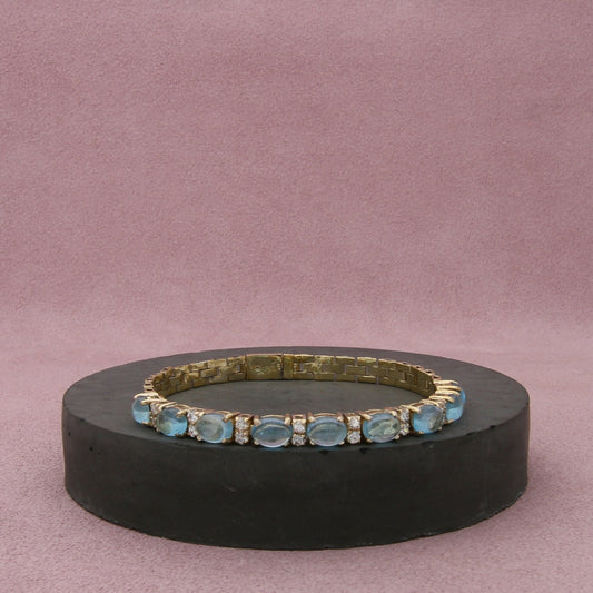 sterling silver gold plate blue topaz cabochon tennis bracelet size 7in