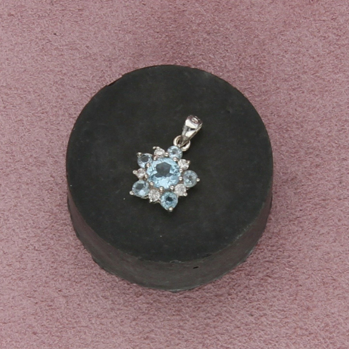 sterling silver blue topaz flower pendant