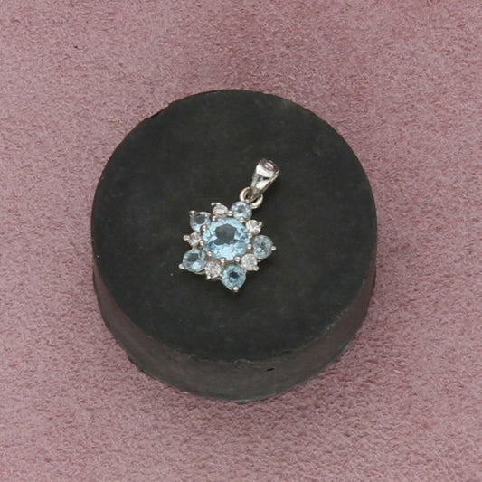 sterling silver blue topaz flower pendant