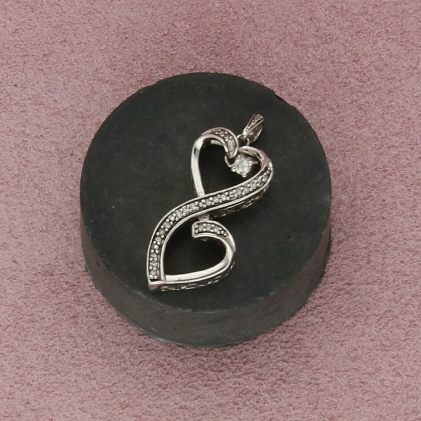 sterling silver diamond accent hearts pendant