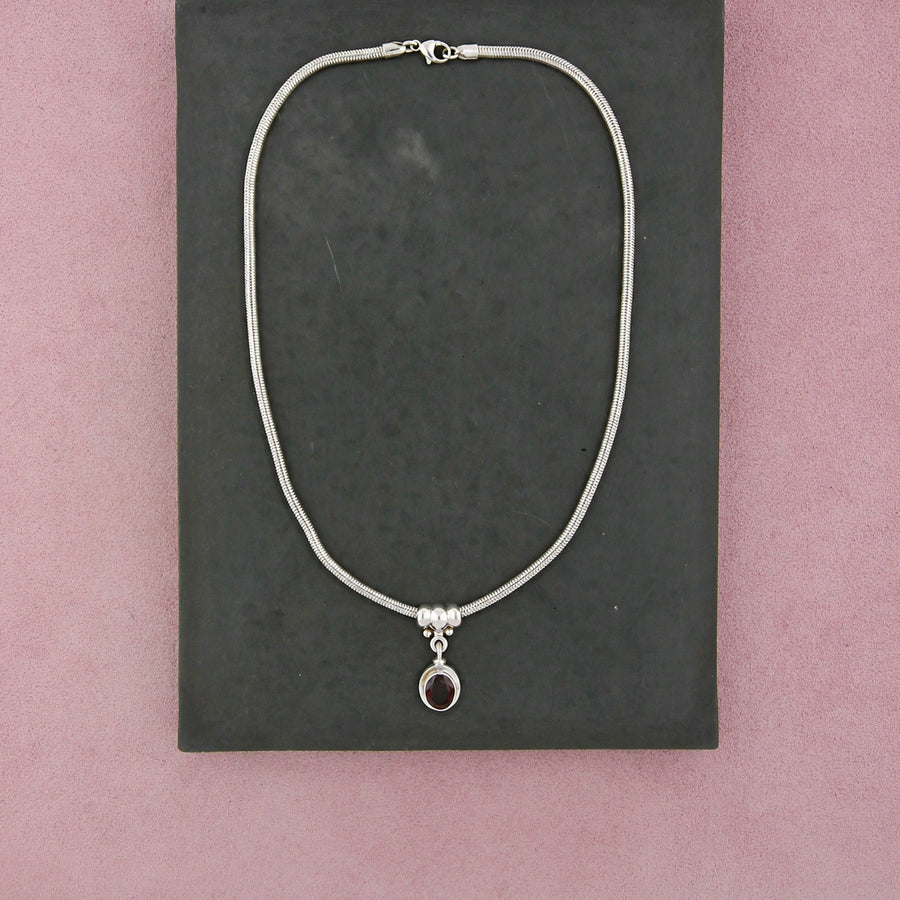 Don & Elizabeth Buck Sterling Silver Reve Oval Garnet Snake Necklace 17in