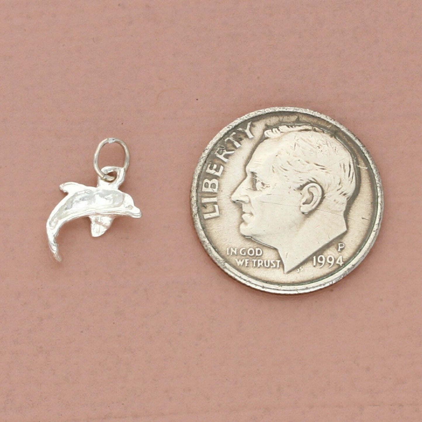 vintage sterling silver swimming dolphin charm